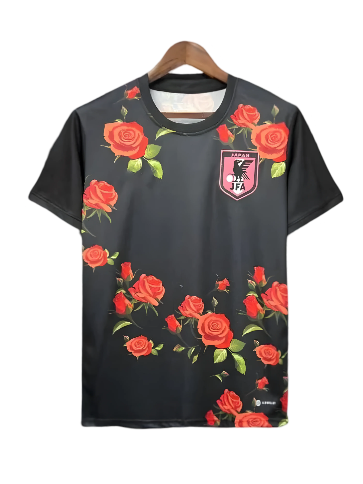 Japan black football shirt featuring red rose pattern design with botanical graphics and sophisticated black base colorway