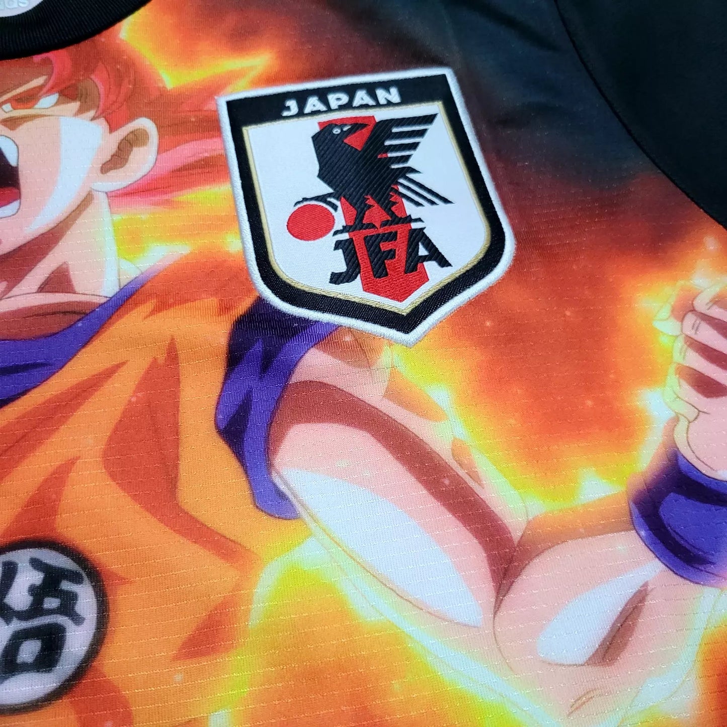 Japan Goku lightning jersey featuring orange electrical effects and storm energy across black fabric by NipponKits Store