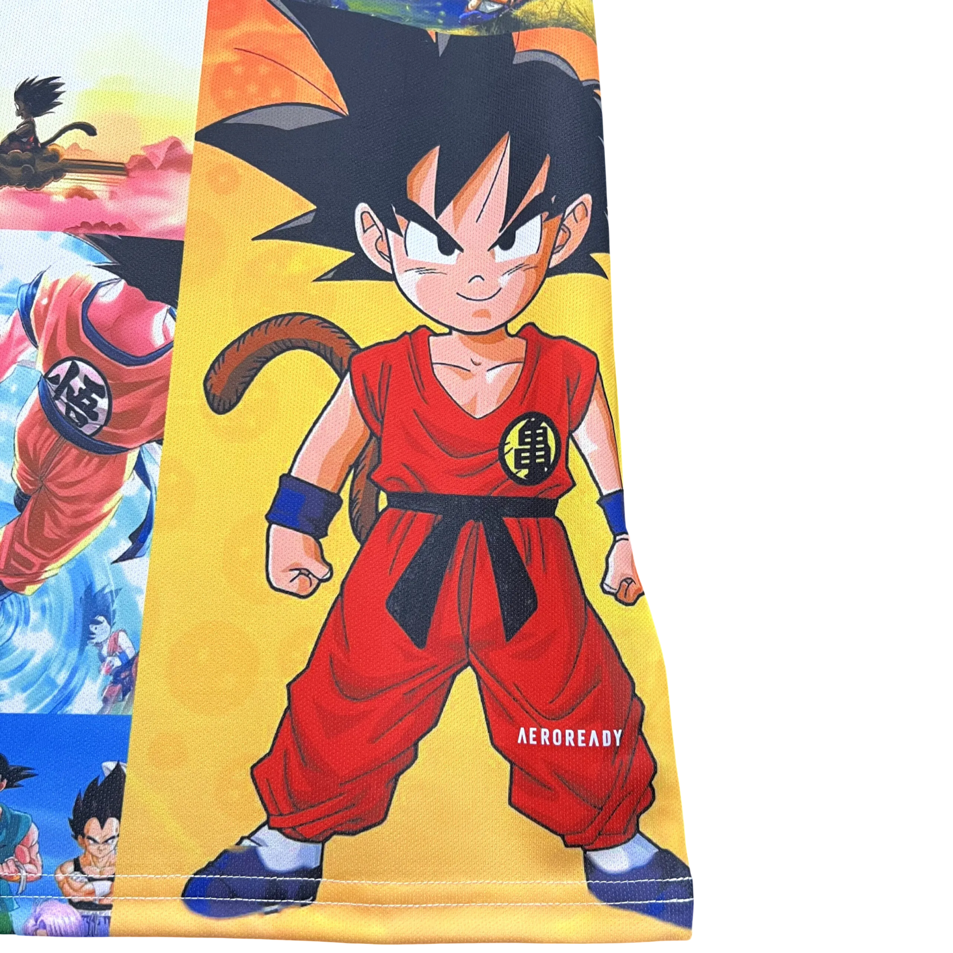 Special edition Goku jersey with colorful mosaic design showing various Dragon Ball moments and characters