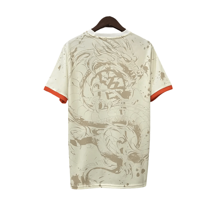 Goku soccer jersey in earth tone beige colors featuring dynamic anime artwork and Japan football badge