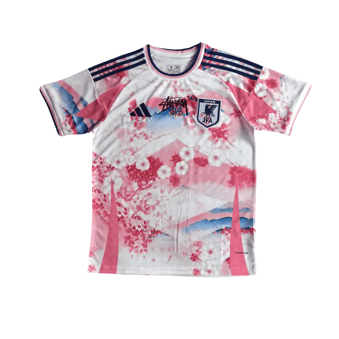 Stussy sakura blossom football jersey with full pink floral artwork and Tokyo script