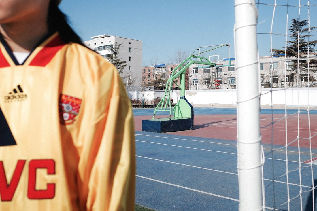 a soccer goalie's jersey on a soccer field