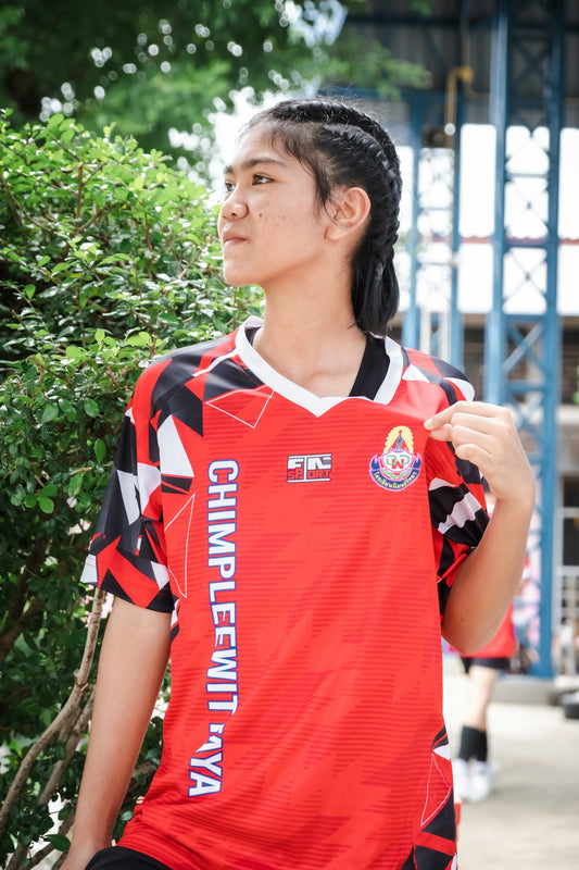 Young woman in a red athletic jersey