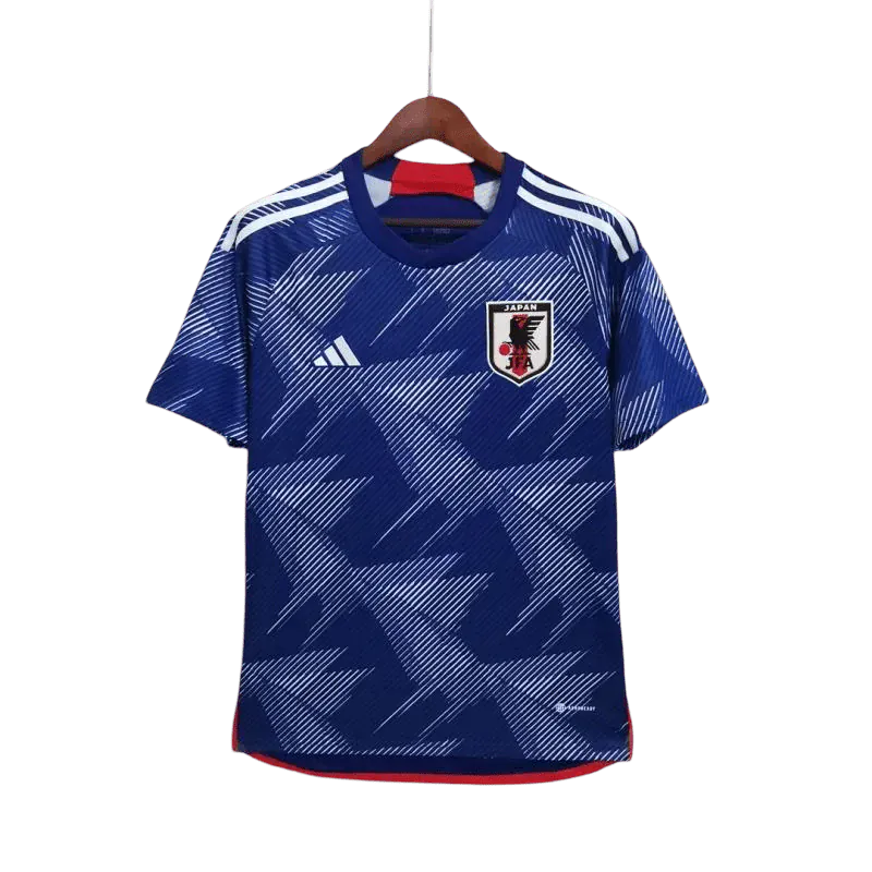 Japan 2022 World Cup home jersey blue soccer shirt with white graphic pattern, JFA crest, Adidas logo, Samurai Blue design