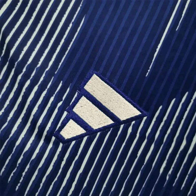Japan 2022 football shirt home fan featuring relaxed fit construction with heat-pressed Adidas branding and official logos