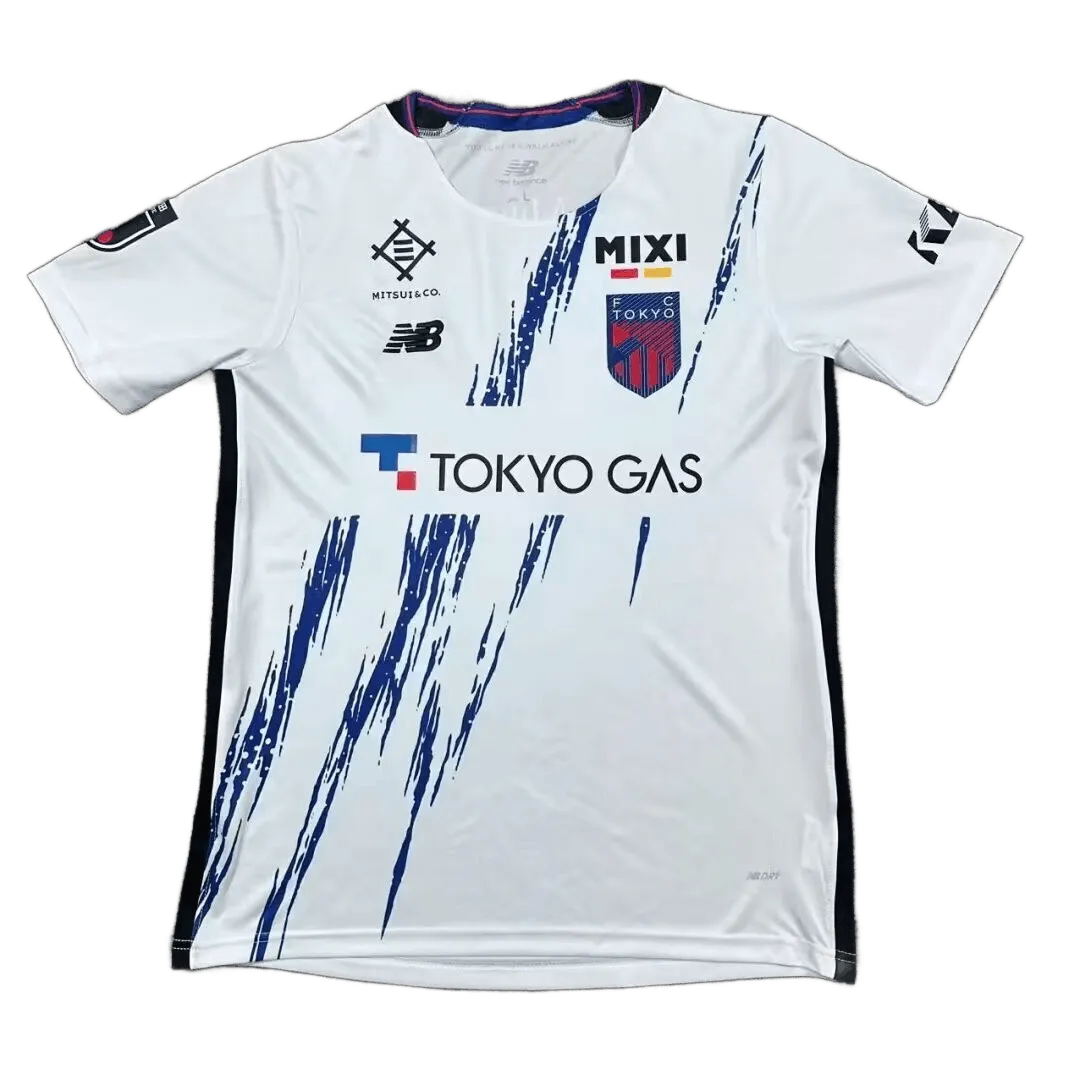 FC Tokyo away jersey 2026-27 fan version front view white with navy brush strokes Tokyo Gas sponsor