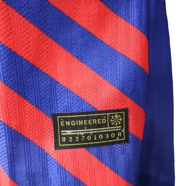 FC Barcelona inspired soccer jersey featuring a vibrant blue and red design with an illustration of Luffy from One Piece in the center, radiating red stripes, and the FCB club crest on the chest
