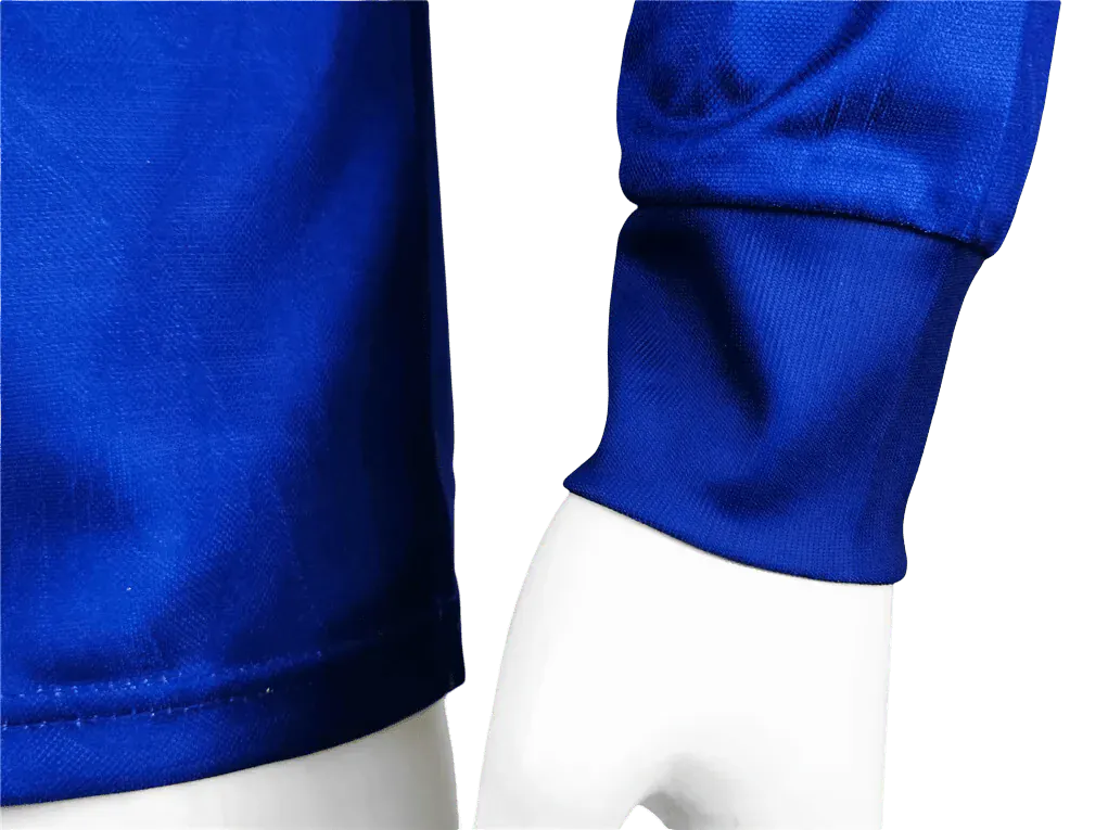 Close-up of blue pants with a white background