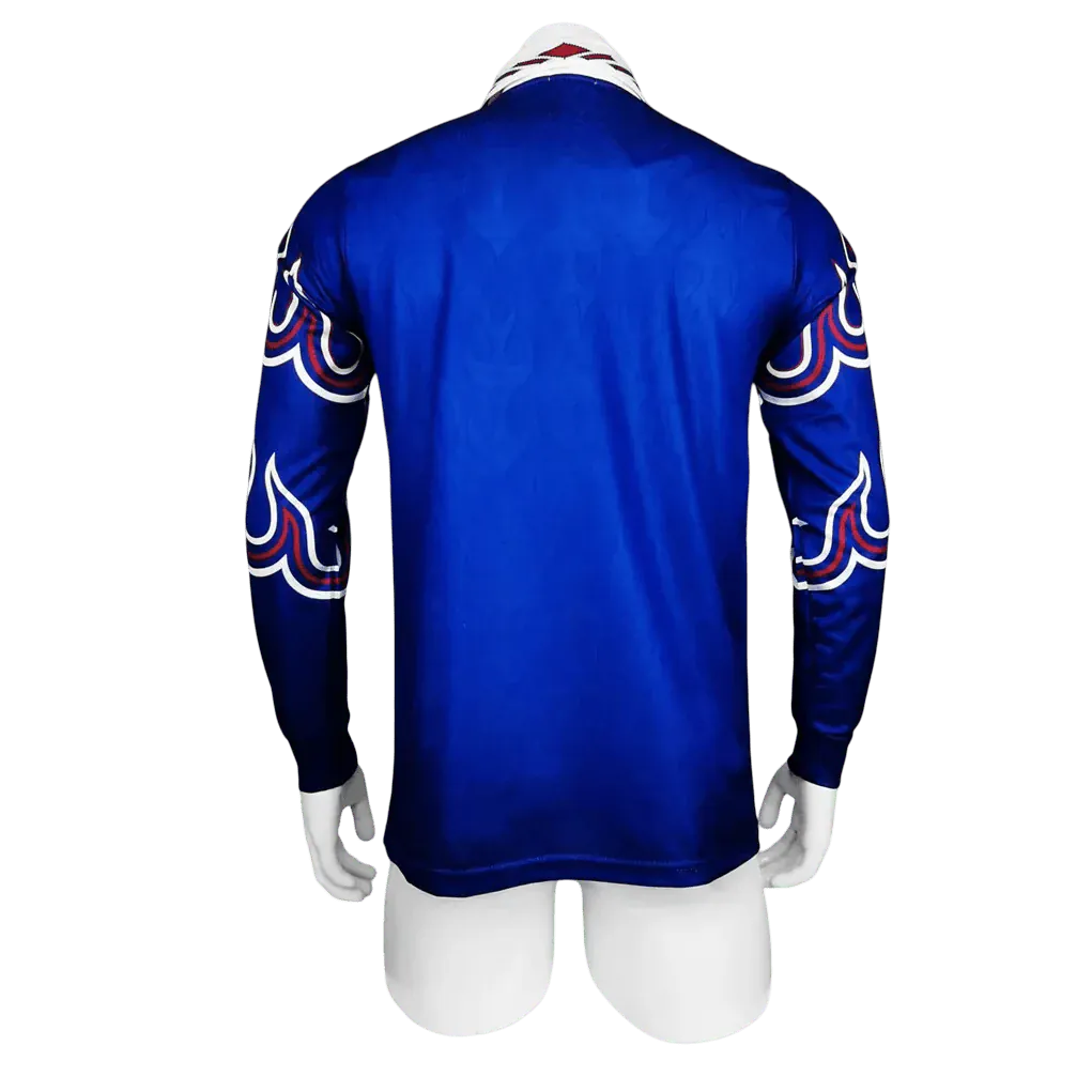 Blue sports jersey with white and red patterns on a mannequin against a white background