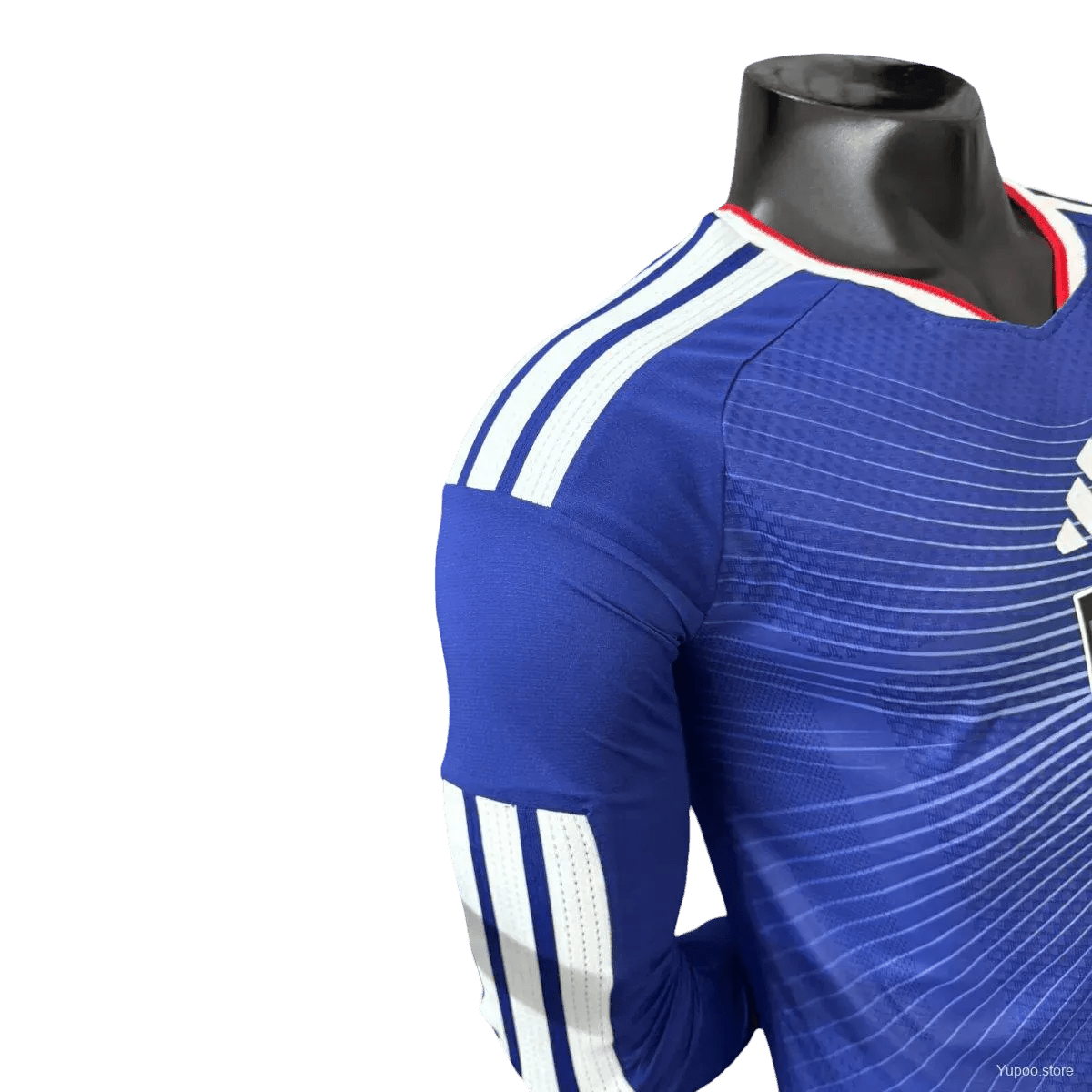 Close-up of advanced sublimation print on Japan 2026 soccer jersey showing vibrant wave pattern detail and color permanence