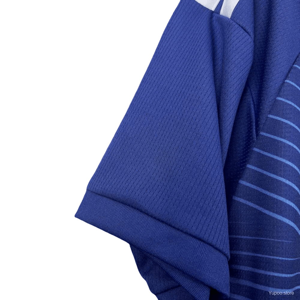 Close-up of a blue textured fabric with white stripes on a white background
