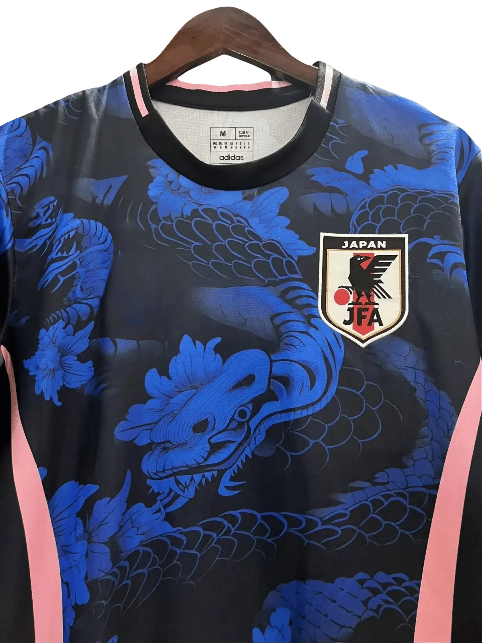 Japan Blue Snake jersey back view black with cobalt-blue serpent and floral all-over pattern, pink side panel edges continuing, dark collar trim