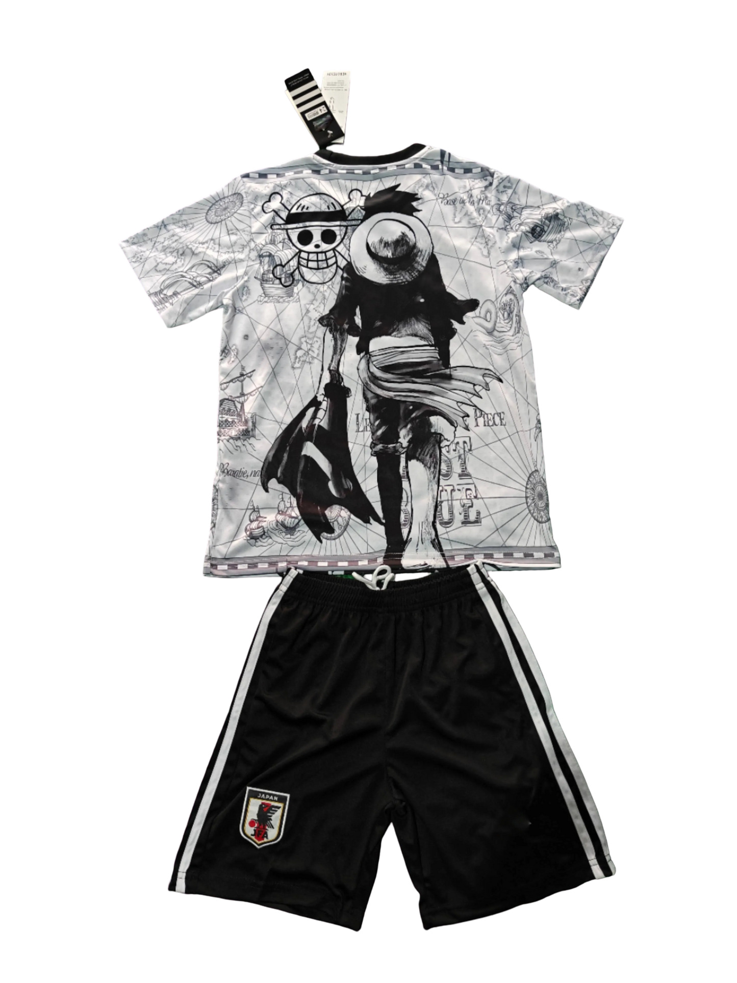 Youth football kit with black and white Luffy artwork