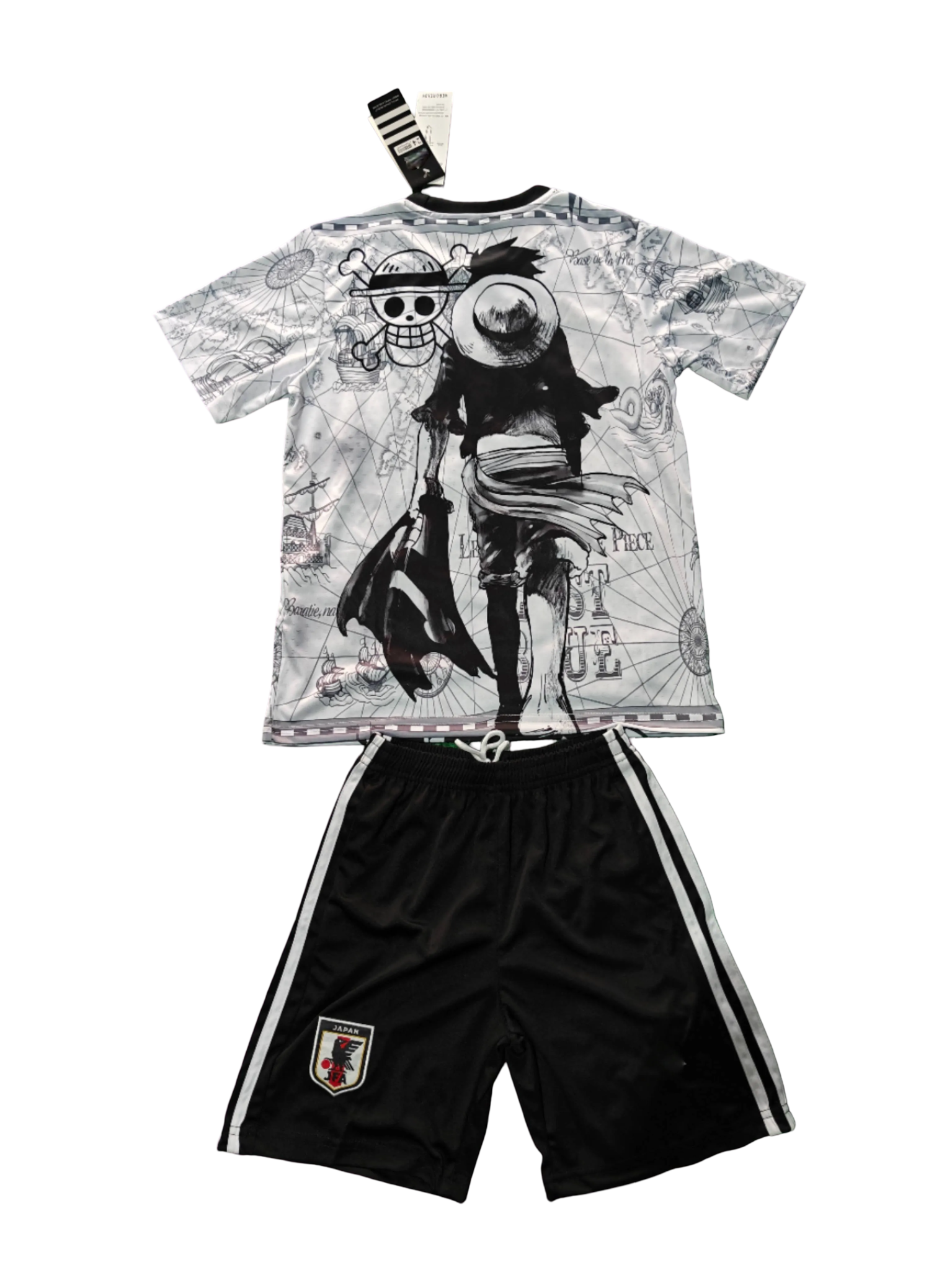 Youth football kit with black and white Luffy artwork