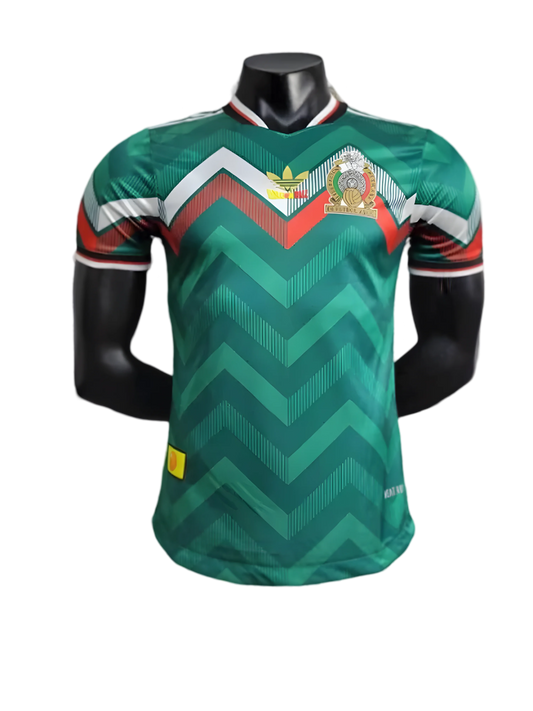 Mexico Dragon Ball green jersey with bold chevron design, anime crest on chest, and red white sleeve accents