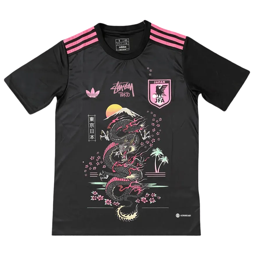 Black Stussy Japan soccer jersey with pink dragon graphic and JFA crest front view