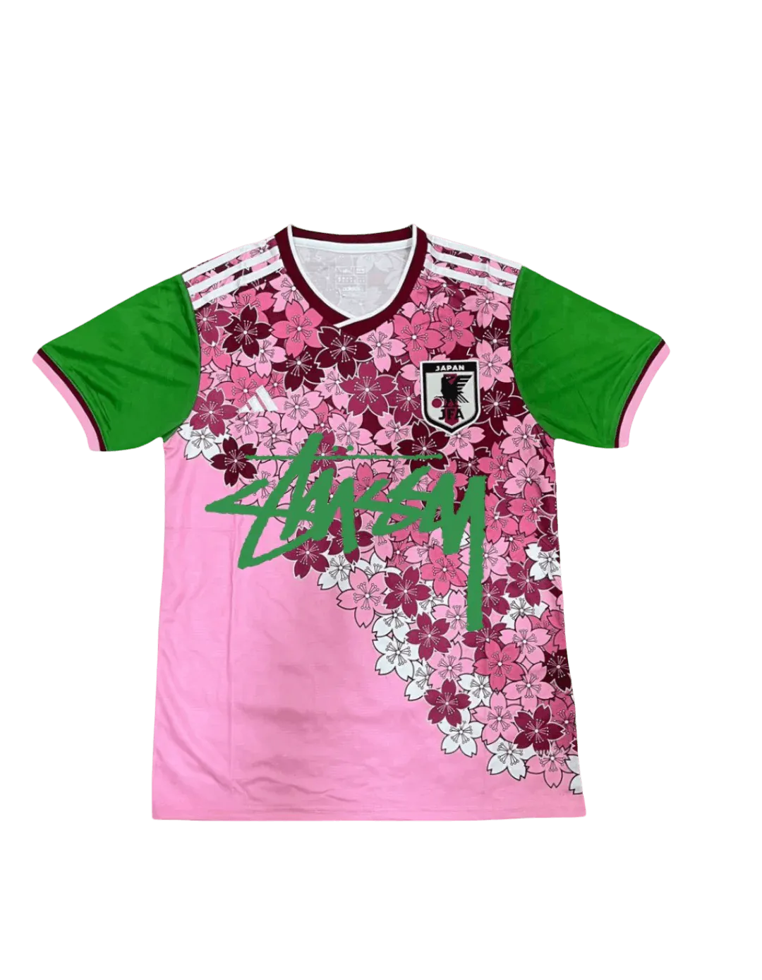 Pink Stussy Japan soccer jersey with sakura blossom design and green sleeves